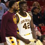 Arizona State’s Jethro Tshisumpa (42) celebrates on the bench with Andre Adams, left. ASU defeated Washington, 86-75, Wednesday at Wells Fargo Arena in Tempe. (Photo by Fabian Ardaya/Cronkite News)