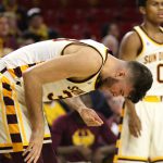 Arizona State’s Ramon Vila, front, reacts after being hit in the face. ASU defeated Washington, 86-75, Wednesday at Wells Fargo Arena in Tempe. (Photo by Fabian Ardaya/Cronkite News)