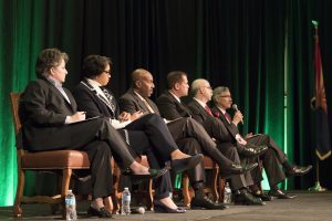 Six police chiefs from across the Valley discuss the relationship between the police and the communities they serve during the Bridge Forum in Scottsdale on Monday. The chiefs include (left to right) Tempe Chief Sylvia Moir, Phoenix Chief Jeri Williams, Peoria Chief Roy Minter, Mesa Interm Chief Michael Dvorak, Salt River Pima-Maricopa County Chief Karl Auerbach and Scottsdale Chief Alan Rodbell. (Photo by Josh Orcutt/Cronkite News)