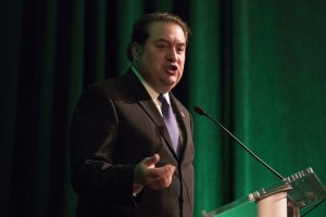 Arizona Attorney General Mark Brnovich speaks to an audience during the Bridge Forum in Scottsdale on Monday. (Photo by Josh Orcutt/Cronkite News)