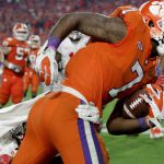 Clemson wide receiver Mike Williams fights for extra yards during the PlayStation Fiesta Bowl at University of Phoenix Stadium in Glendale on Saturday, Dec. 31, 2016. The Clemson Tigers beat the Ohio State Buckeyes, 31-0. (Photo by Logan Newman/Cronkite News)