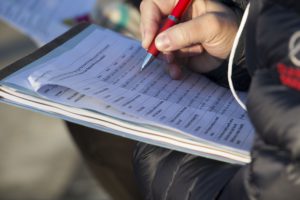 Dawn Whittington fills out a survey during the Point-in-Time homeless count on Tuesday. (Photo by Tynin Fries/Cronkite News)