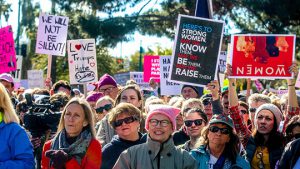 Marchers in the streets of Phoenix joined thousands of people in Arizona, the U.S. and across the world in solidarity of the Women’s March on Washington. (Photo by Saeed Alshamisi/Cronkite News)