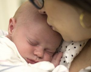 Tara Spillman spends time with her newborn, Maxton, at a neonatal intensive care unit in the Maricopa Integrated Health System. He was born while his mother was in custody. (Photo by Johanna Huckeba/Cronkite News)