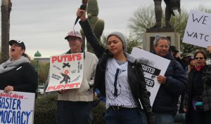 People protesting President Donald Trump on Inauguration Day at the Arizona Capitol. (Photo by Ethan Millman/Cronkite News)