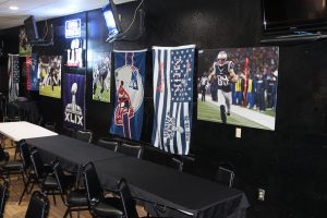 New England Patriots memorabilia lines the walls of Toso’s Sports Bar & Grill in Phoenix, Arizona on Monday Jan. 30, 2017. (Photo by Mark Harris/Cronkite News) 