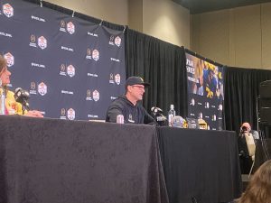 Michigan coach Jim Harbaugh was a junior quarterback for the Wolverines when he last participated in the Fiesta Bowl, in 1986. (Photo by Nicholas Hodell/Cronkite News)