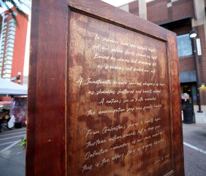 The first door of The Doorways installation represents the past and displays a poem written by Tamar Burch. Photo taken at the Juneteenth Block Party in Tempe, on June 15. (Photo by Stella Subasic/Cronkite News)