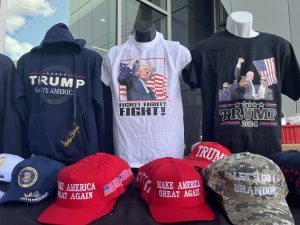 Donald Trump T-shirts and hats for sale by Anthony Montgomery at the RNC (Republican National Convention) on July 17 in Milwaukee, Wisconsin. (Photo by Amaia J. Gavica/Cronkite News)