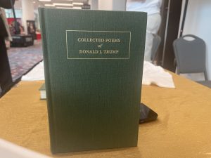 Side covers of the “Collected Poems of Donald J. Trump” sold by Ian Pratt and Gregory Woodman at the RNC (Republican National Convention) on July 16 in Milwaukee, Wisconsin. (Photo by Amaia Gavica/Cronkite News)