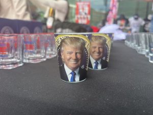 Shot glasses shaped like Donald Trump for sale by Anthony Montgomery at the RNC (Republican National Convention) on July 16 in Milwaukee, Wisconsin. (Photo by Amaia J. Gavica/Cronkite News)