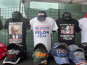 Donald Trump T-shirts and hats for sale by Anthony Montgomery at the RNC (Republican National Convention) on July 15 in Milwaukee, Wisconsin. (Photo by Amaia J. Gavica/Cronkite News)